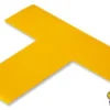 Yellow T-shaped floor marking tape.