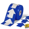 Blue floor tape with white arrows.