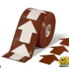 Brown floor tape with white arrows.