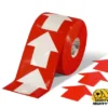 Red floor tape with white arrows.