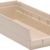 Beige plastic storage bin with dividers.