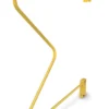 Gold metal wall-mounted clothes rack.